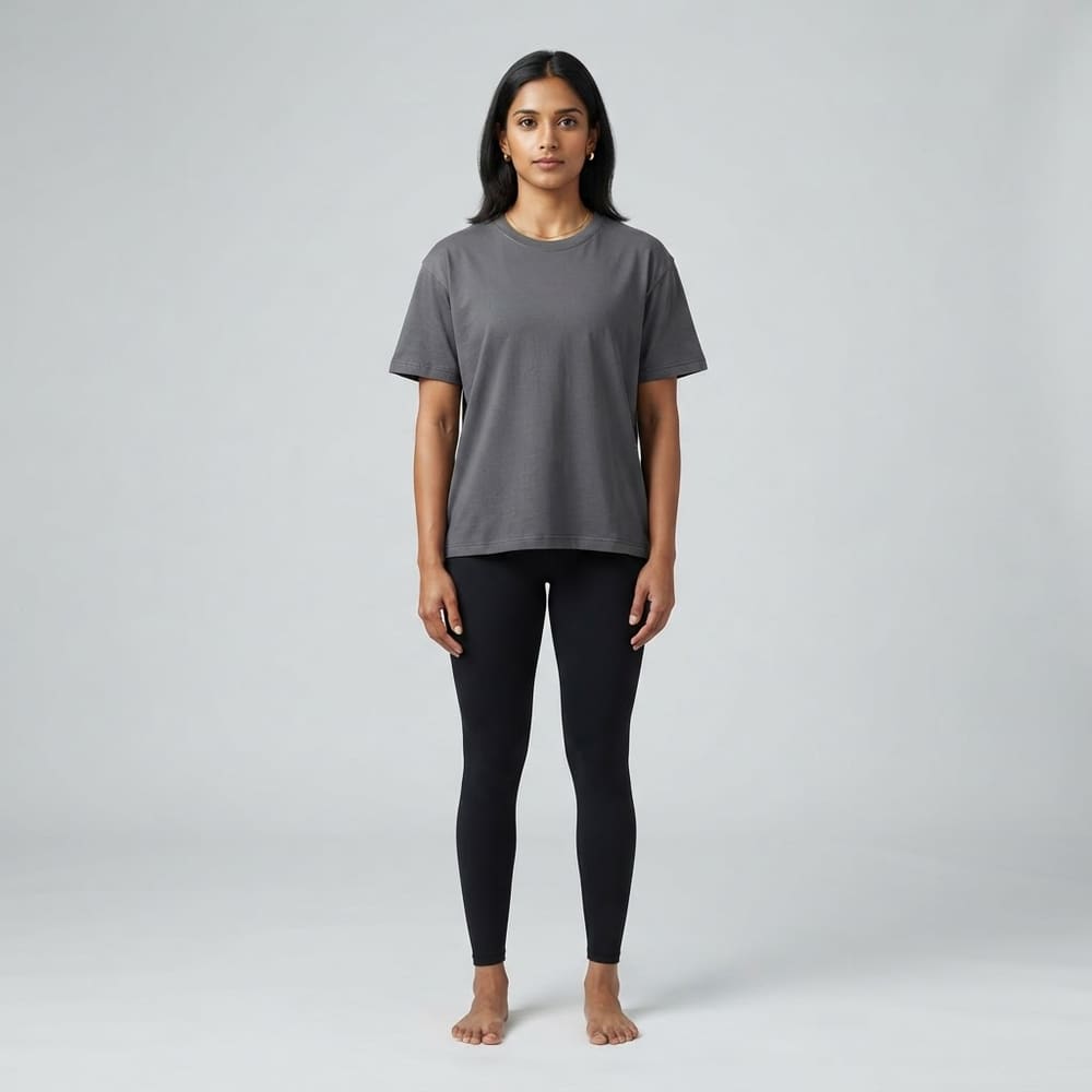Indian woman wearing META NEST ACTIVEWEAR Relaxed Boxy Tee in Storm Charcoal